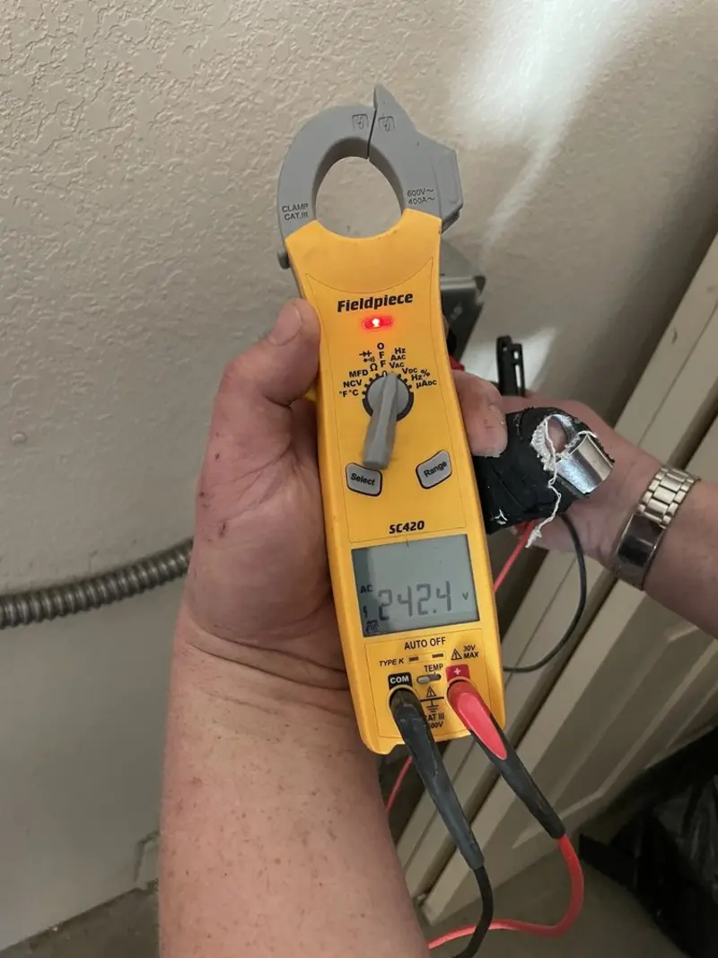Voltage testing with clamp meter during Electrical Installation Services in Big Bear Lake